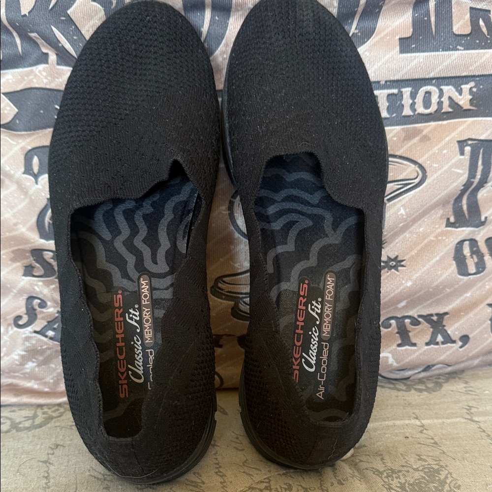 Skechers Black Knit Slip-Ons
Size 9 1/2